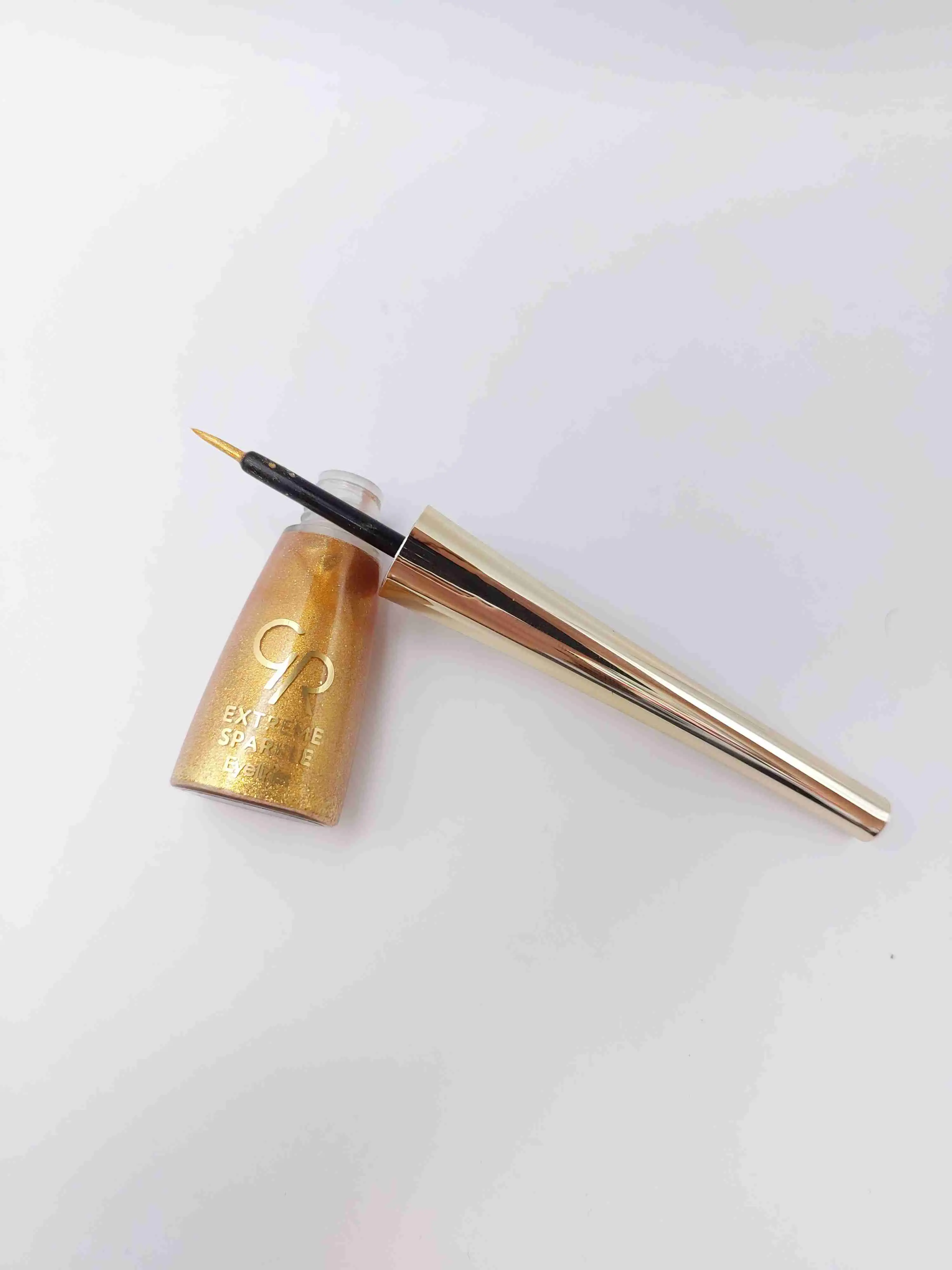 خط چشم ماژیکی کوزه ای ضد آب رنگ مشکی براق لیکوئید آیلایتر شماره 103 GOLDEN ROSE Extreme Sparkle